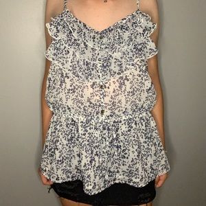 White and blue patterned tank top.